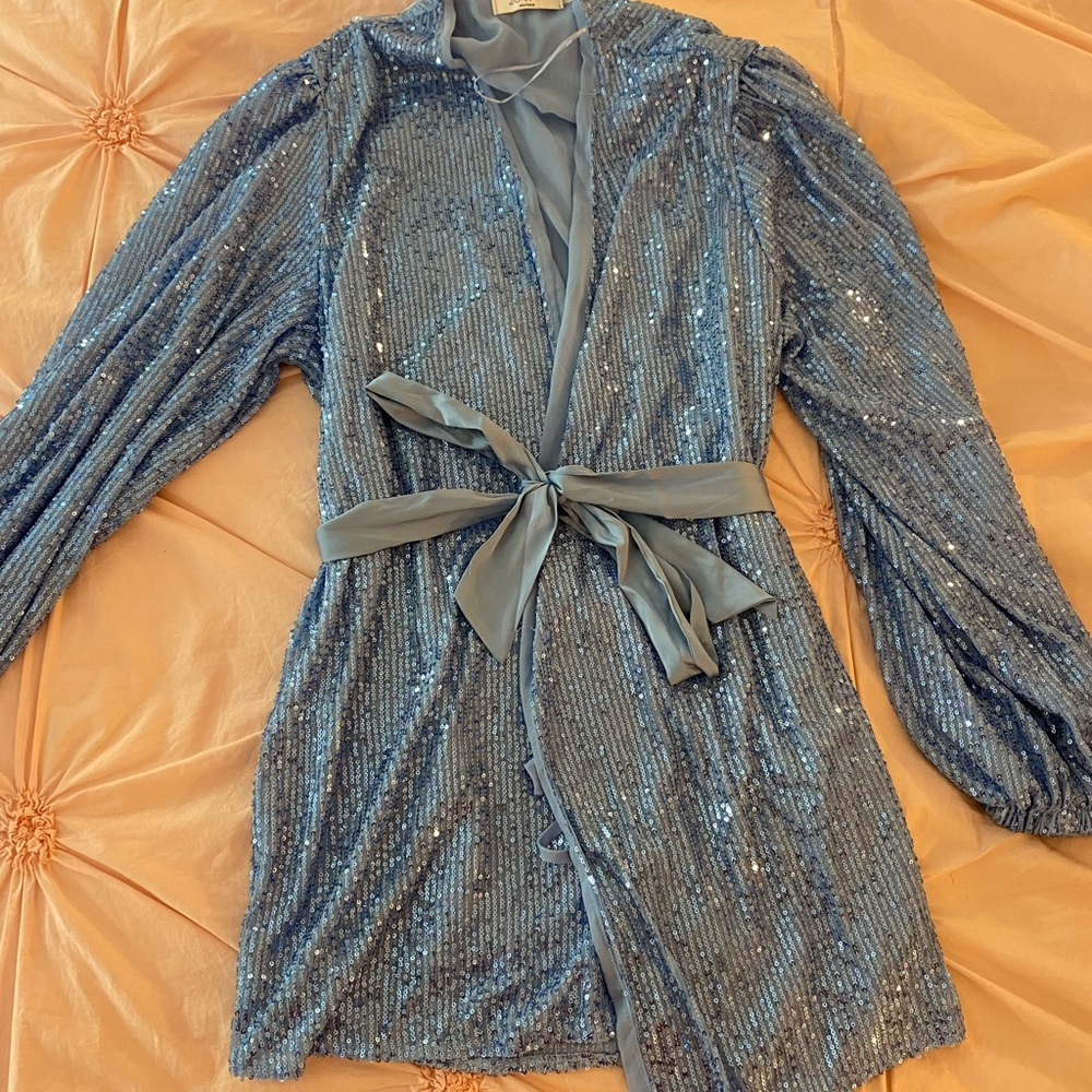 Blue sequin mini dress with puff sleeves and silk tie around
